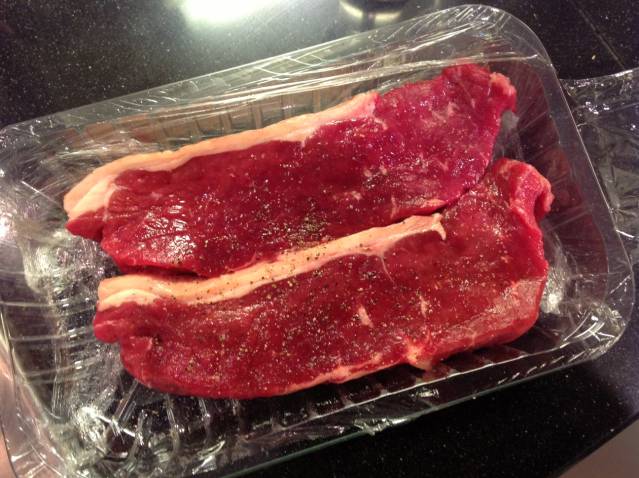 Raw Strip Steaks