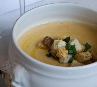 A bowl of apple and parsnip soup.