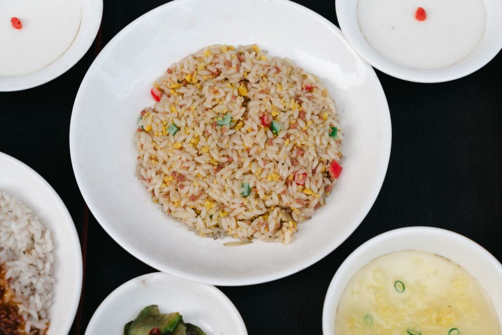 A plate of tasty fried rice without soy sauce.