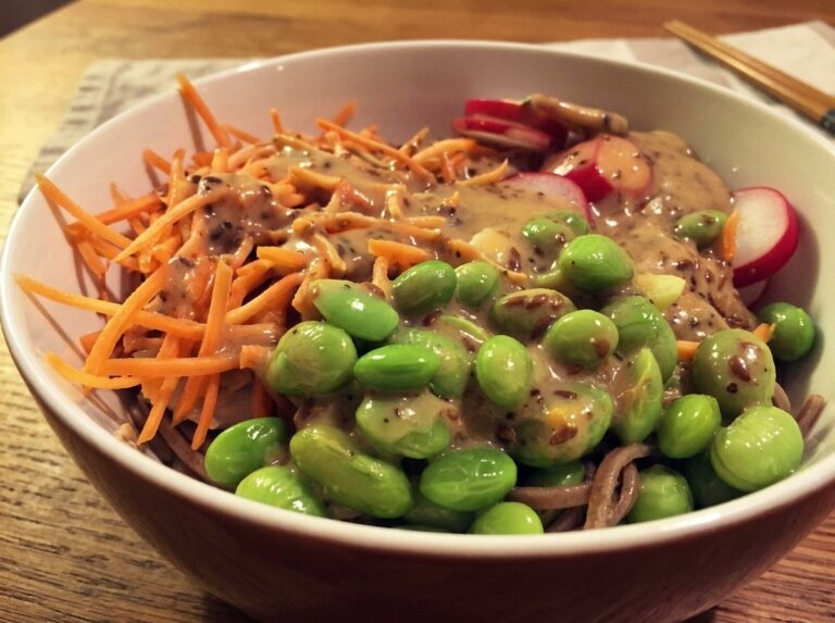 A bowl of Asian salad with sesame dressing, ready to serve.