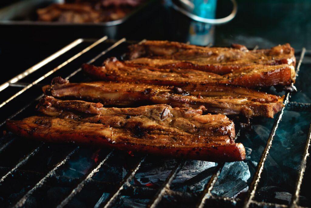 Speklappen cooking on a grill