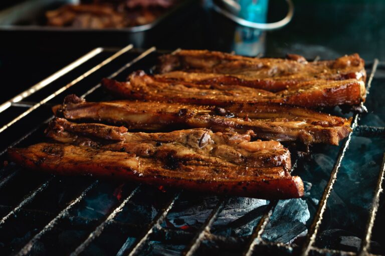 Speklappen cooking on a grill