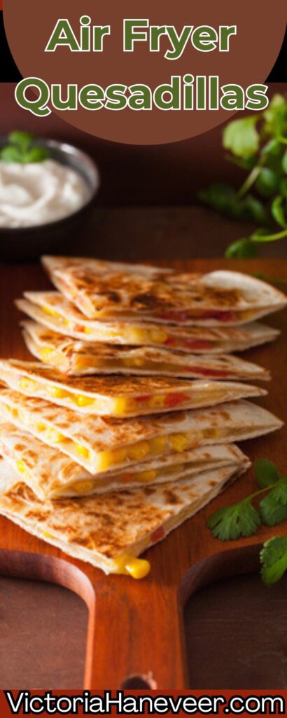 sliced hot and crispy air fryer quesadilla on a cutting board