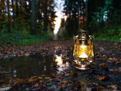 an oil lamp on the ground