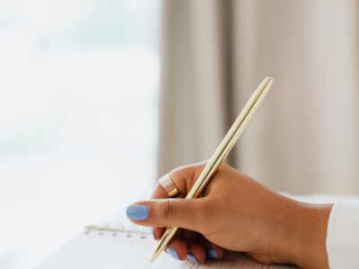 Someone writing and keeping a good record in a logbook