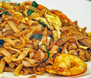 A plate of Malaysian char kway teow ready to eat.