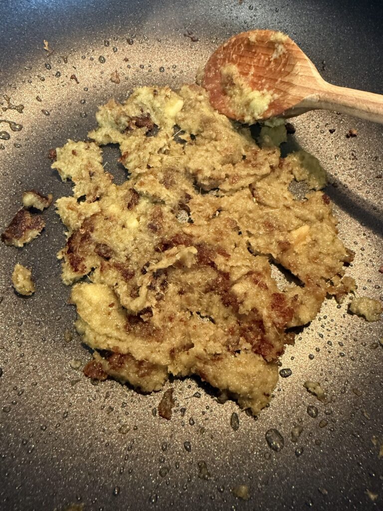 Malaysian spice paste known as rempah beginning to brown.