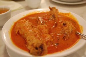 Kari kapitan Penang Nyonya chicken curry in a bowl.