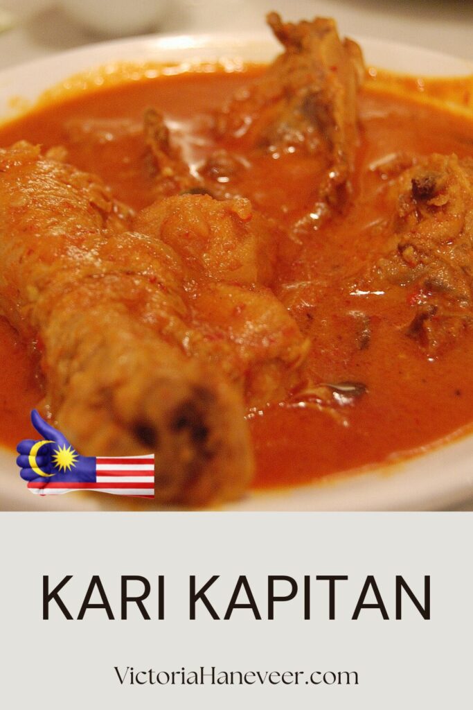 Kari kapitan Penang Nyonya chicken curry in a white dish.