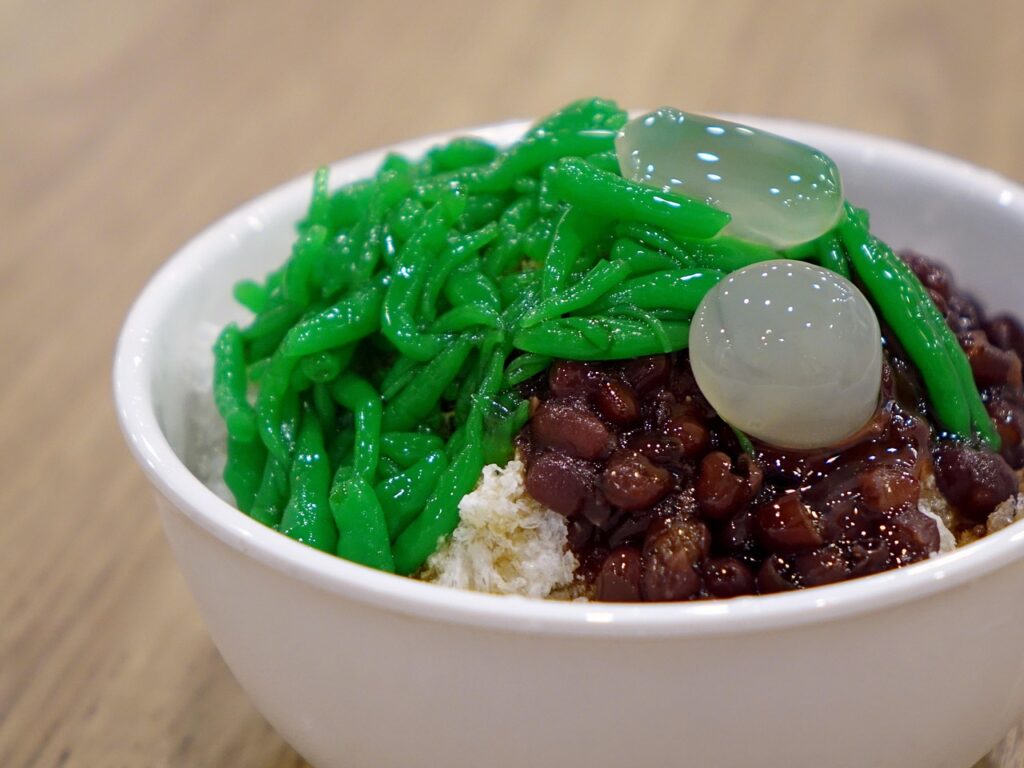 Cendol with coconut milk, palm sugar syrup and red beans.